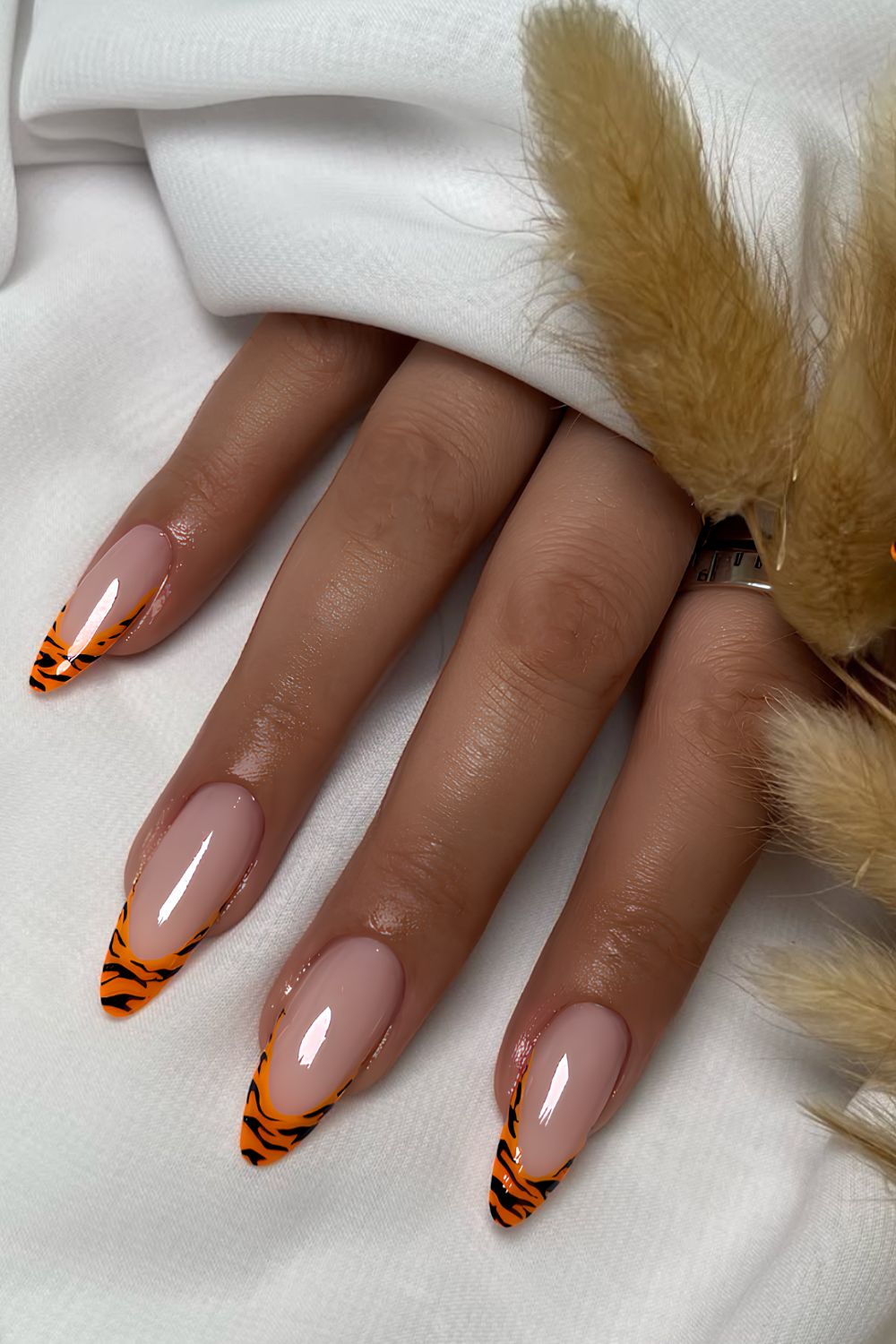 Orange French mani with animal print