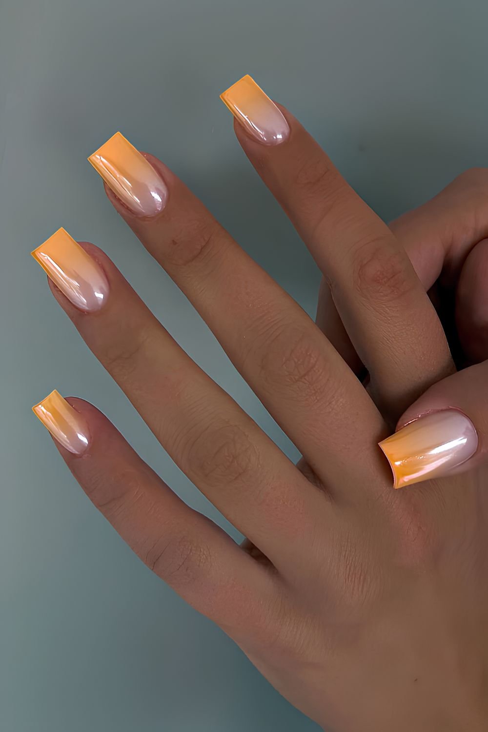 Orange chrome ombre nails