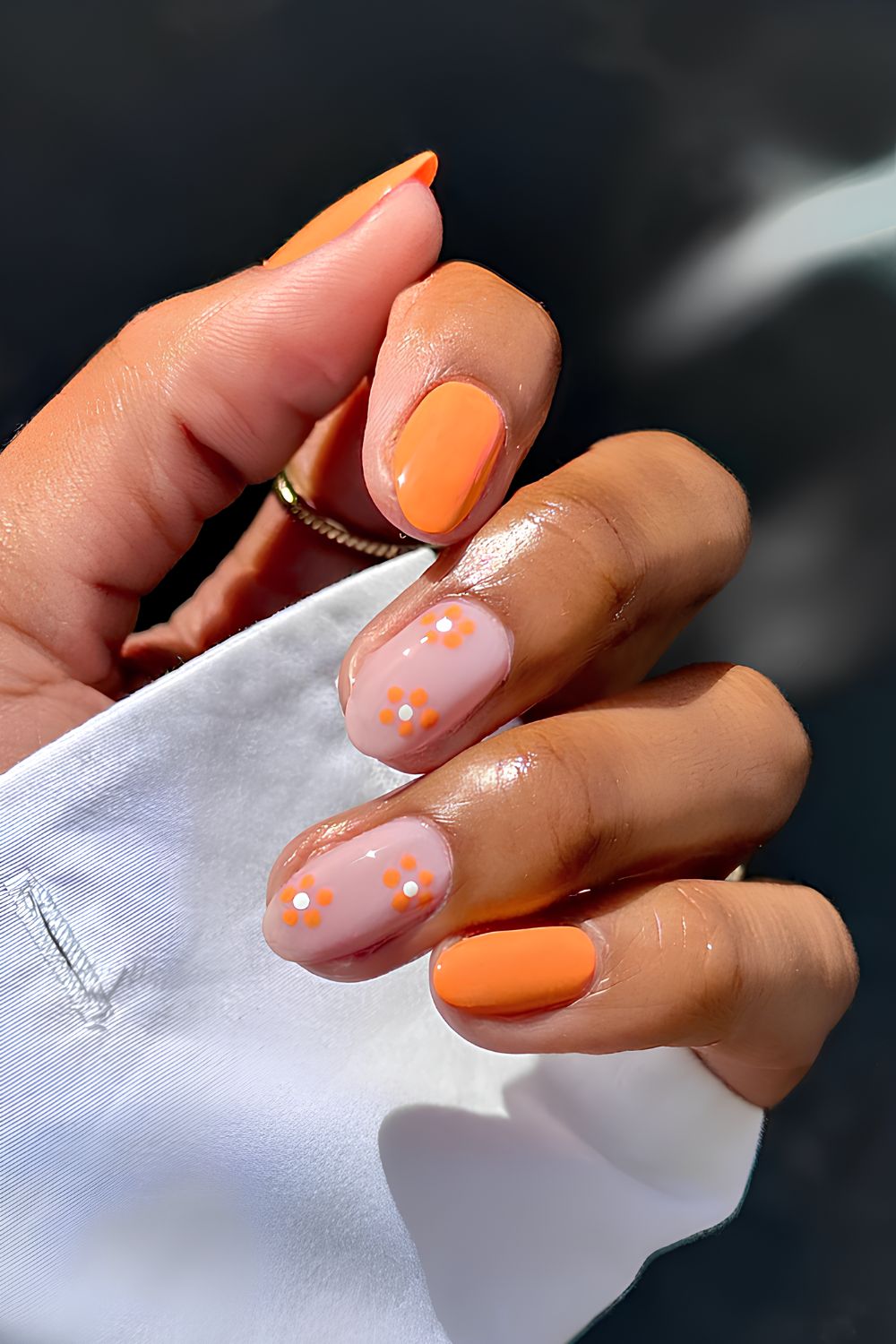 Orange floral manicure
