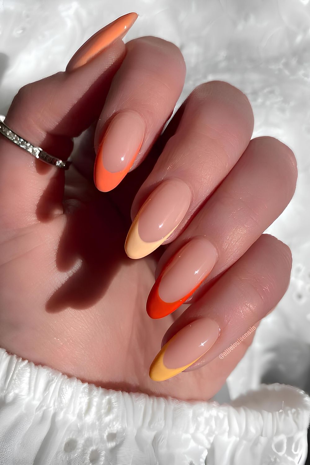 Orange skittle French nails