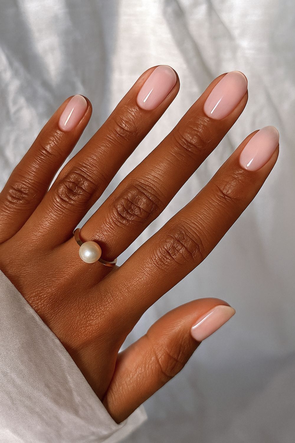 Oval sheer milky pink nails