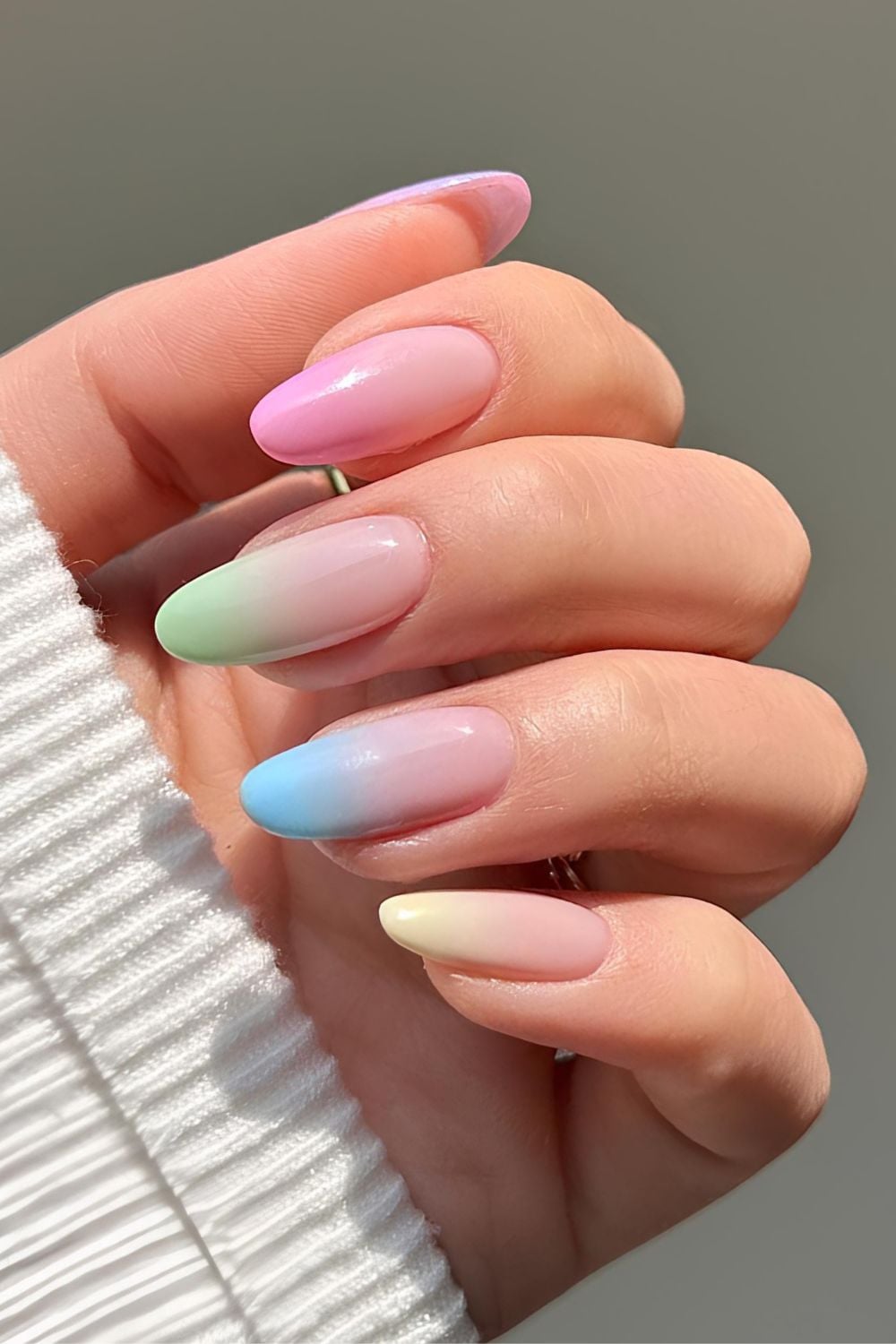 Pastel ombre nails in skittle design