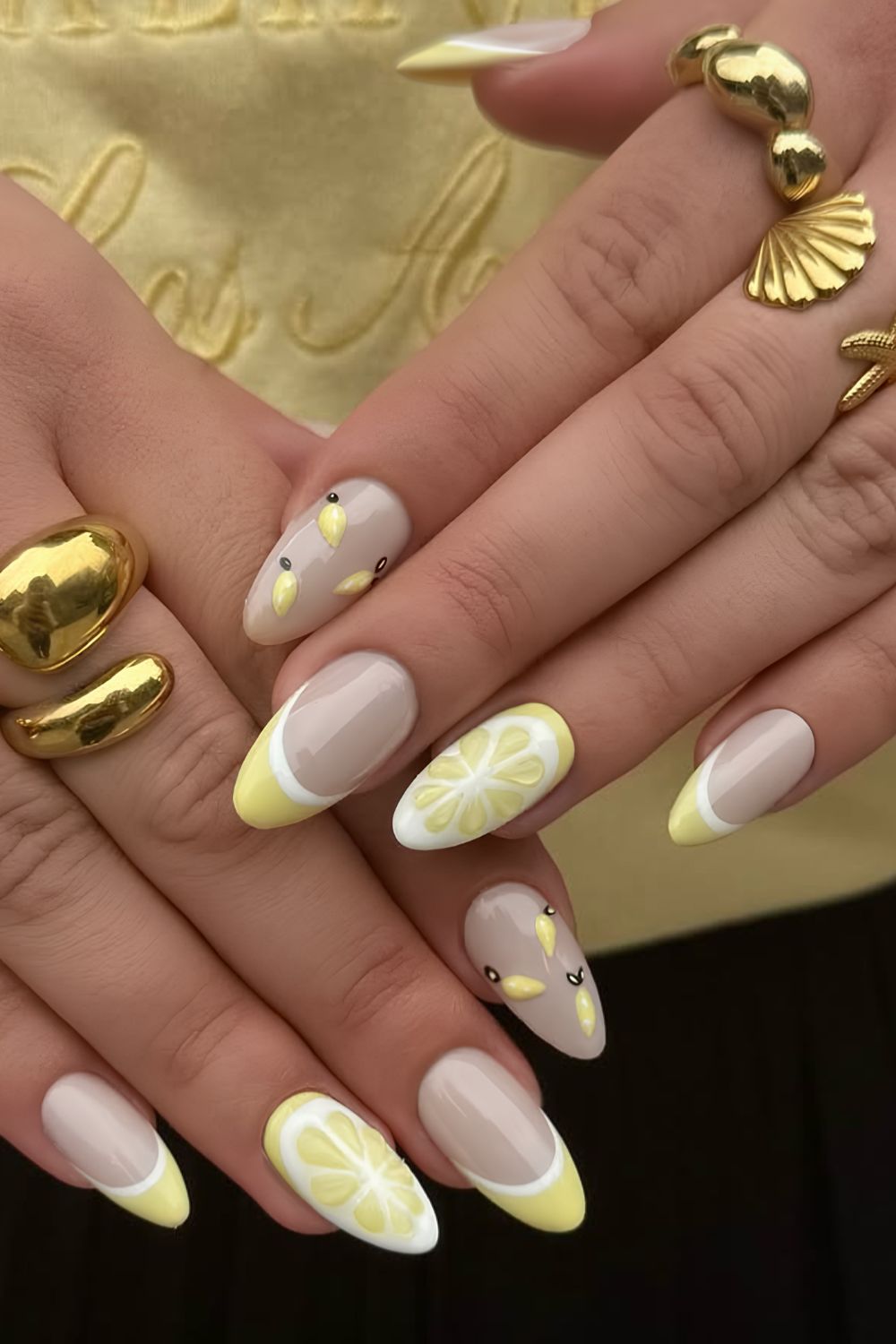 Pastel yellow French mani with textured lemon art