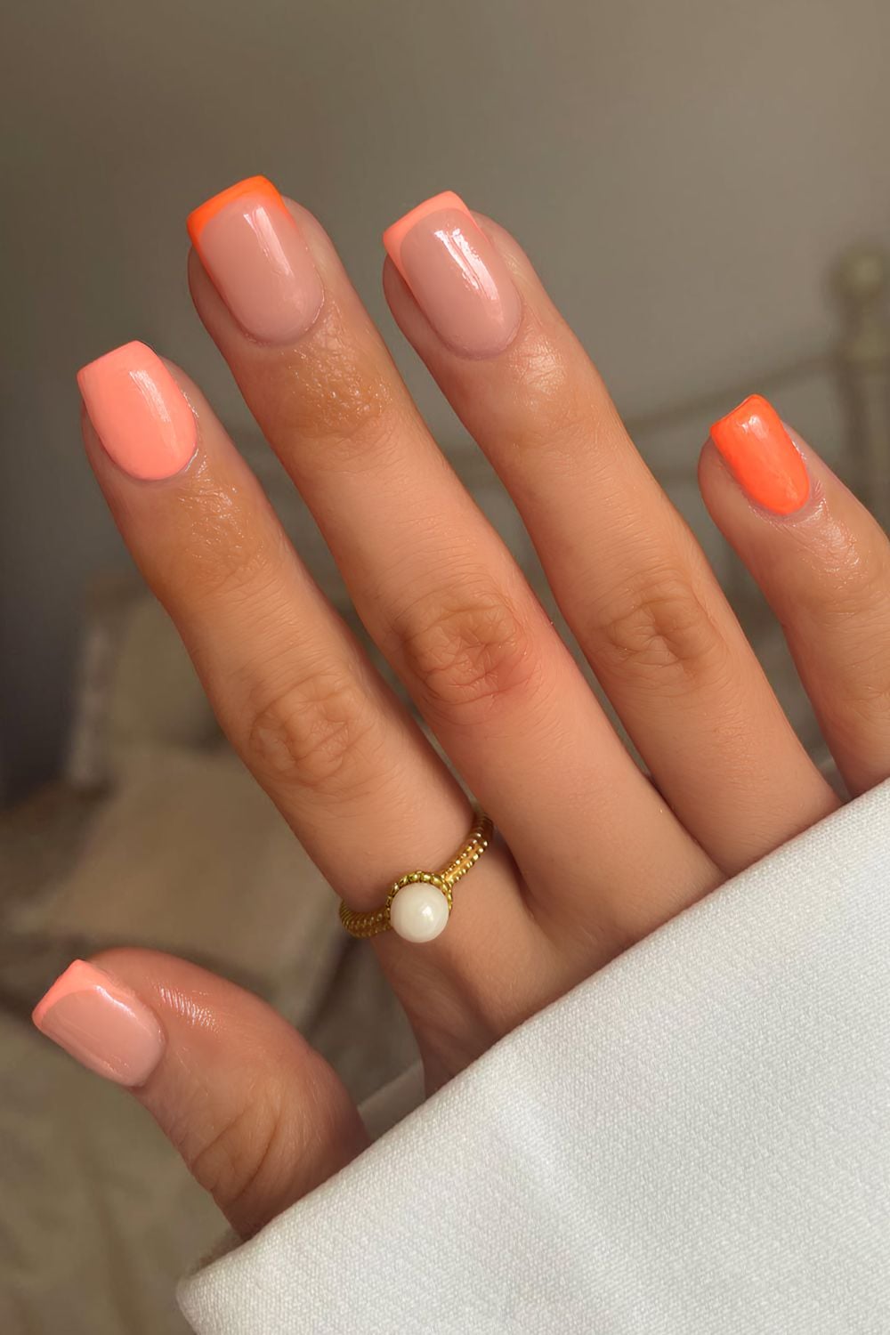 Peach and orange manicure