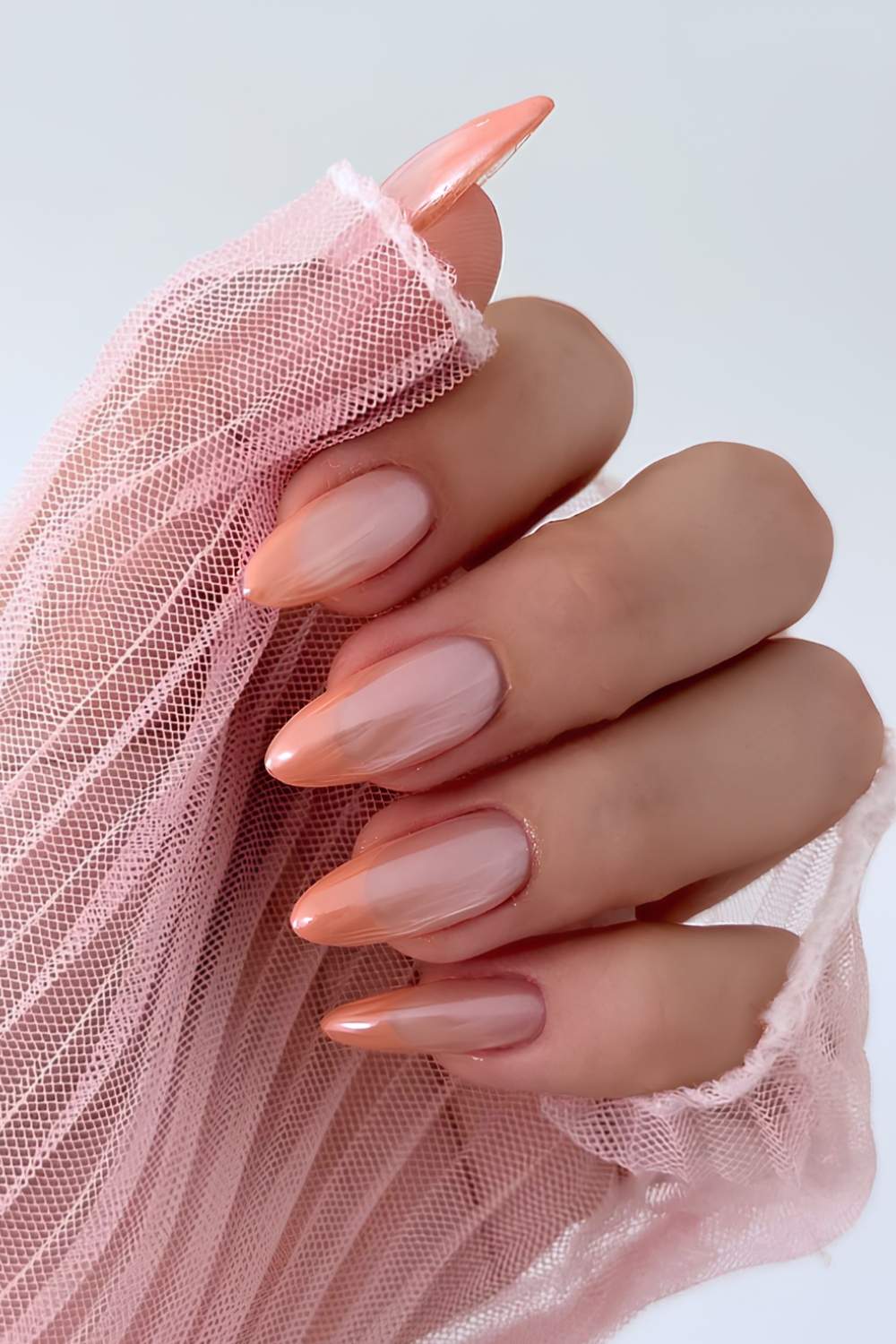 Peach chrome French manicure