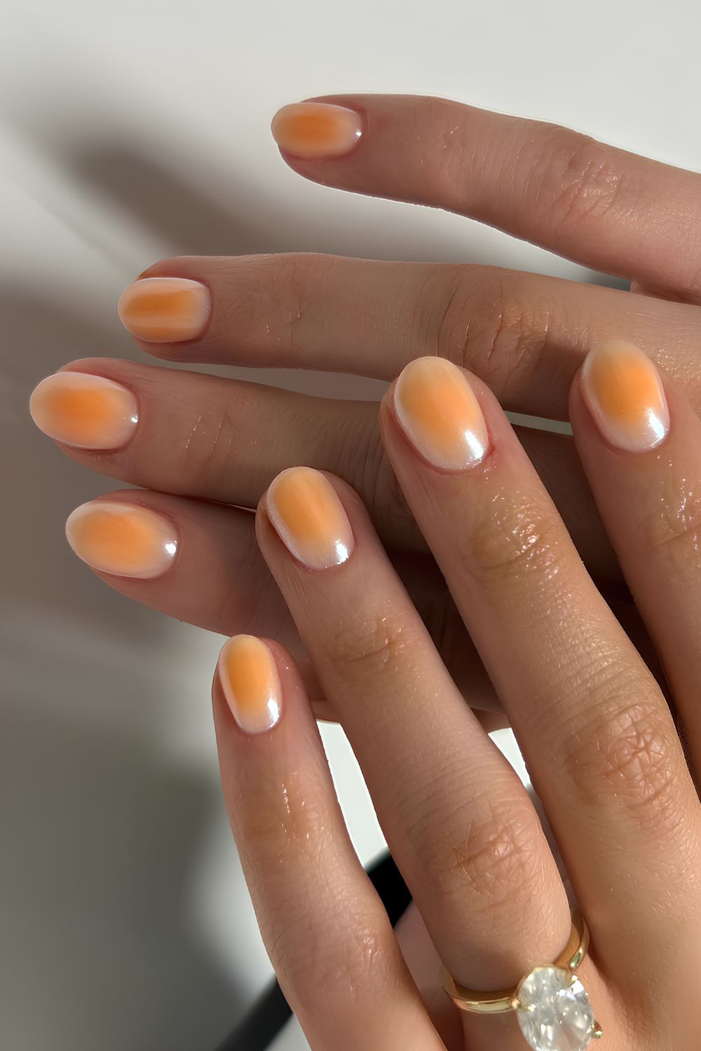 Peach chrome aura mani