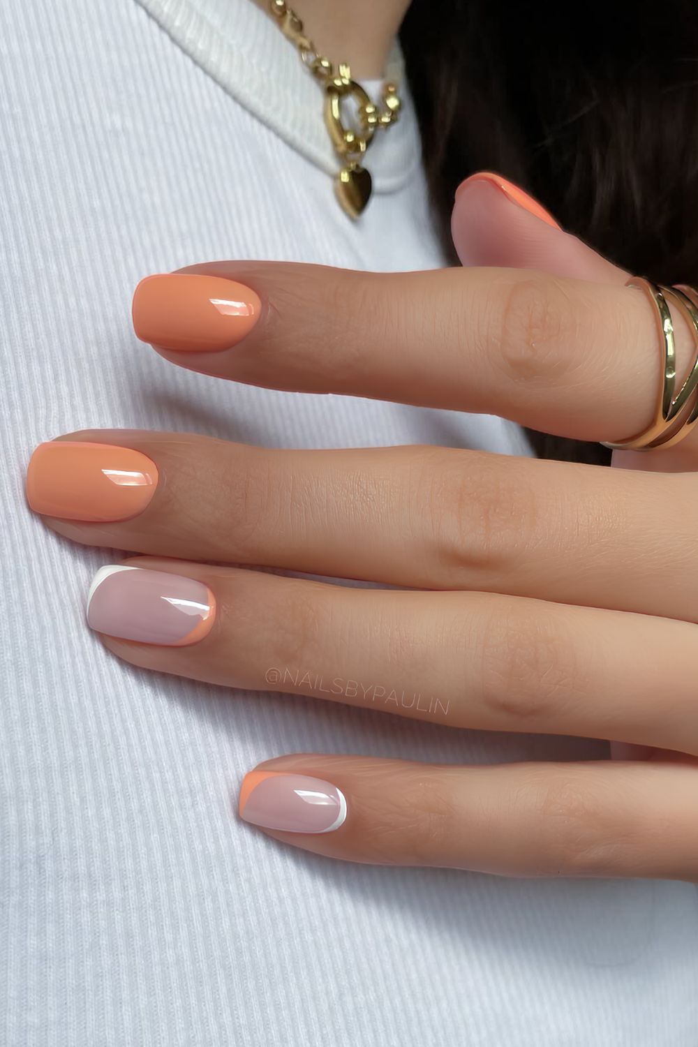 Peach nails with white accents