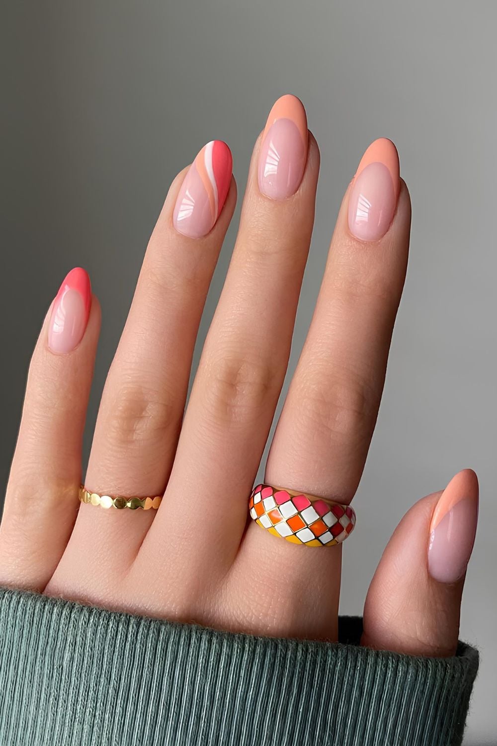 Peachy French nails with swirl accent