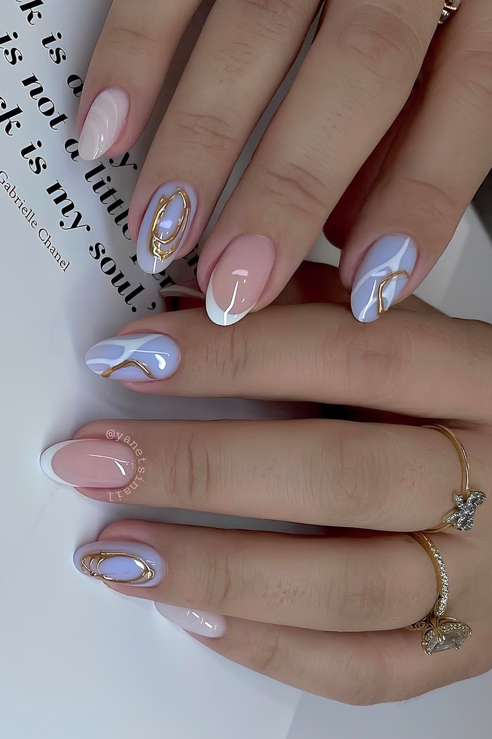 Periwinkle blue and white nails with gold chrome accents