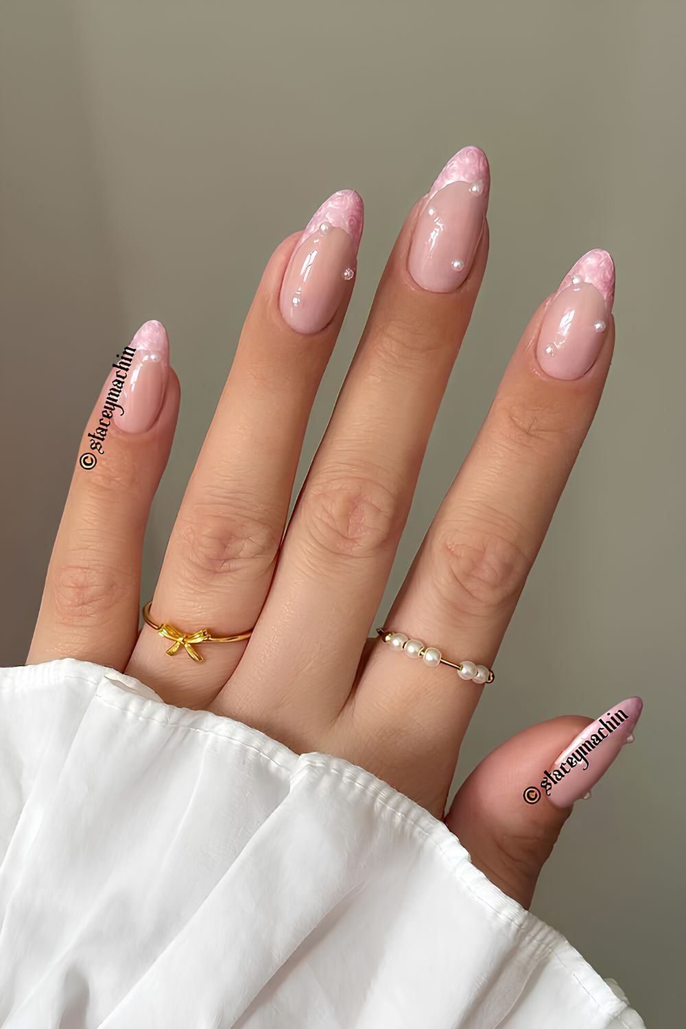 Pink French mani with pearl stickers