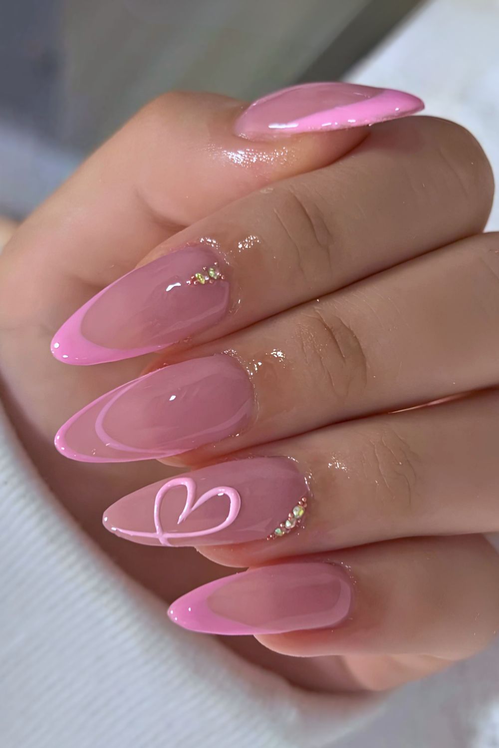 Pink French nails with heart doodle