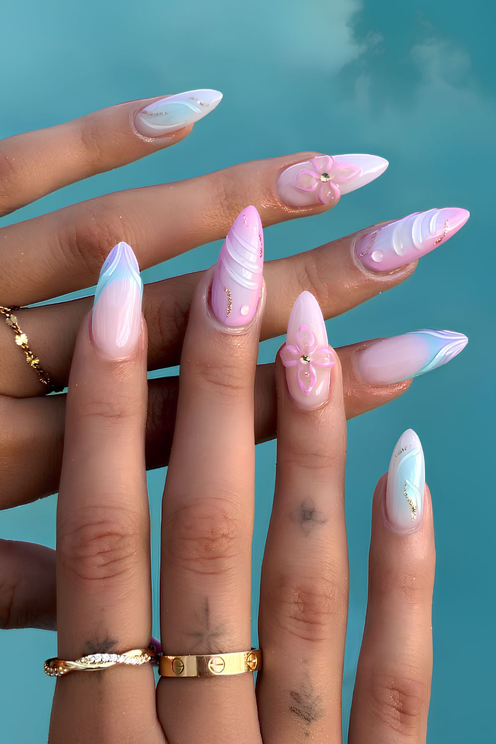 Pink and blue mermaid-inspired nails