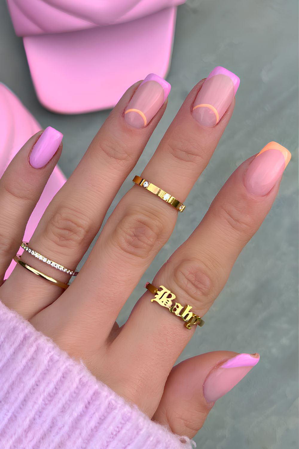 Pink and orange French mani with halfmoon outlines