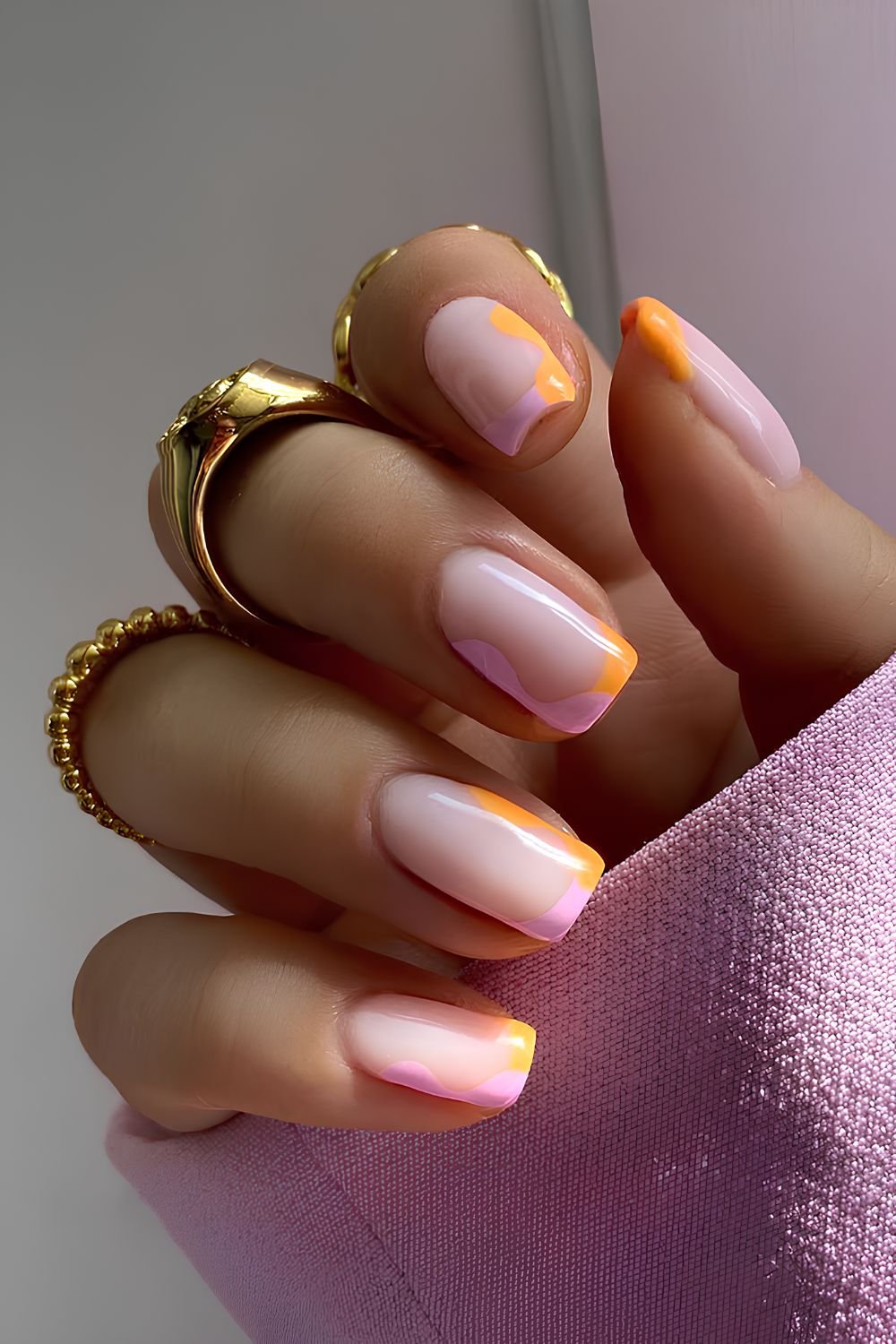 Pink and orange abstract French mani