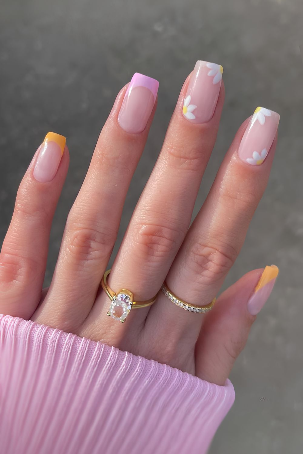 Pink and orange daisy nails