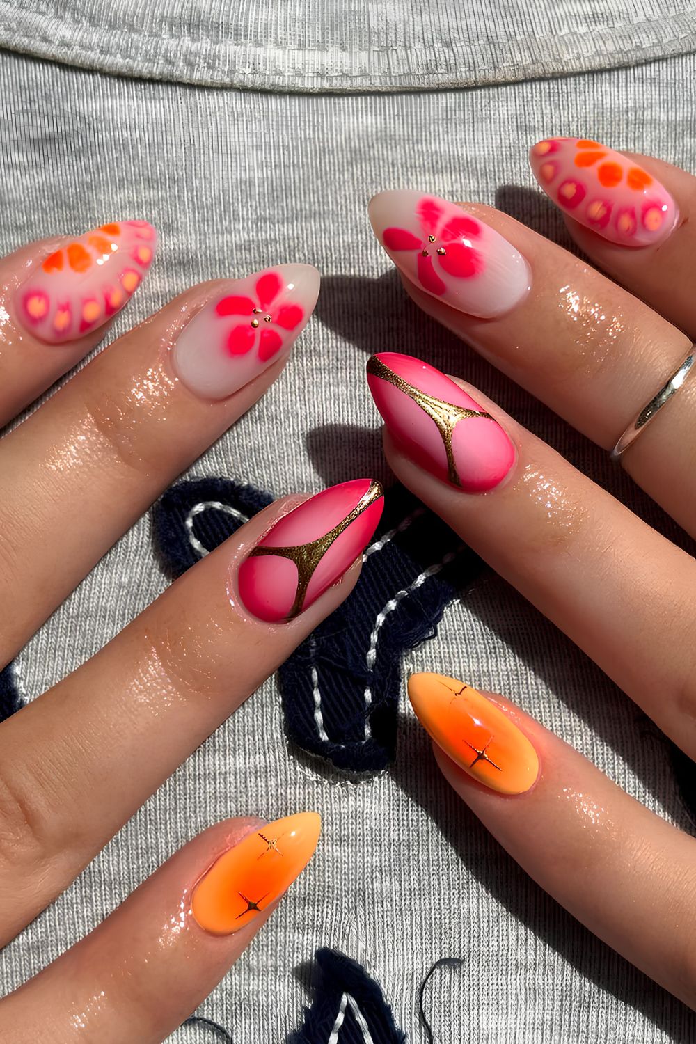 Pink and orange mani with florals and animal print