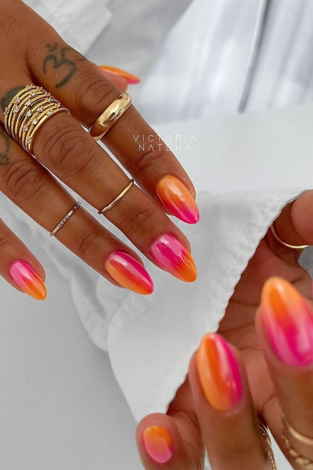 Pink and orange sunset mani with soft blends