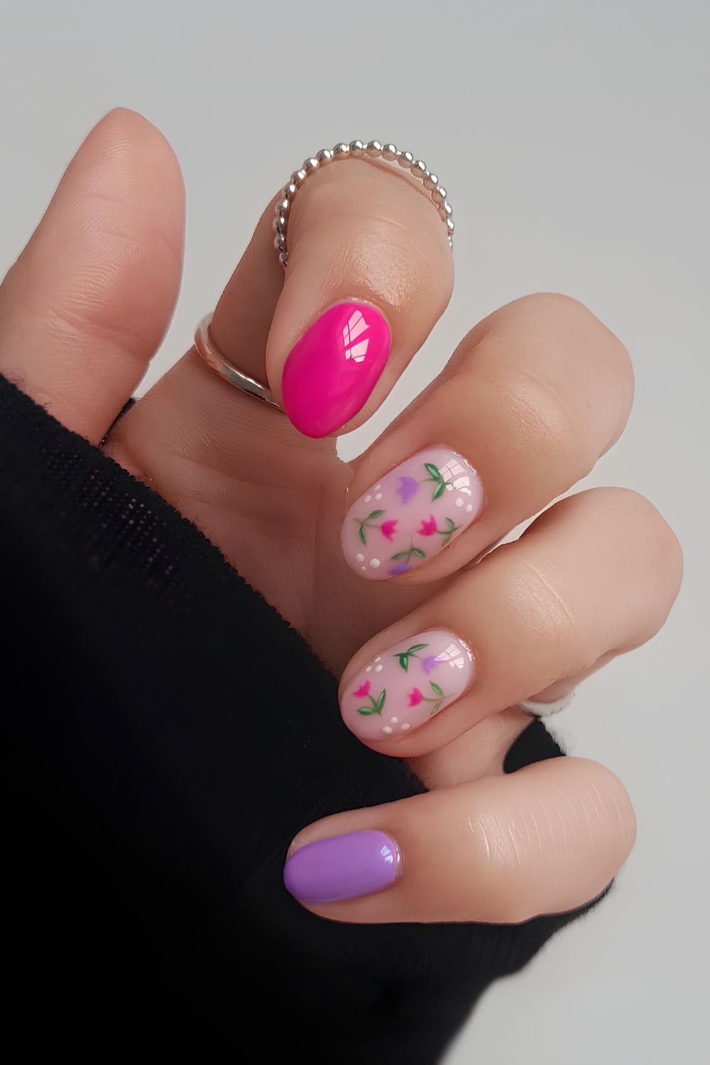 Pink and purple nails with tulip accents