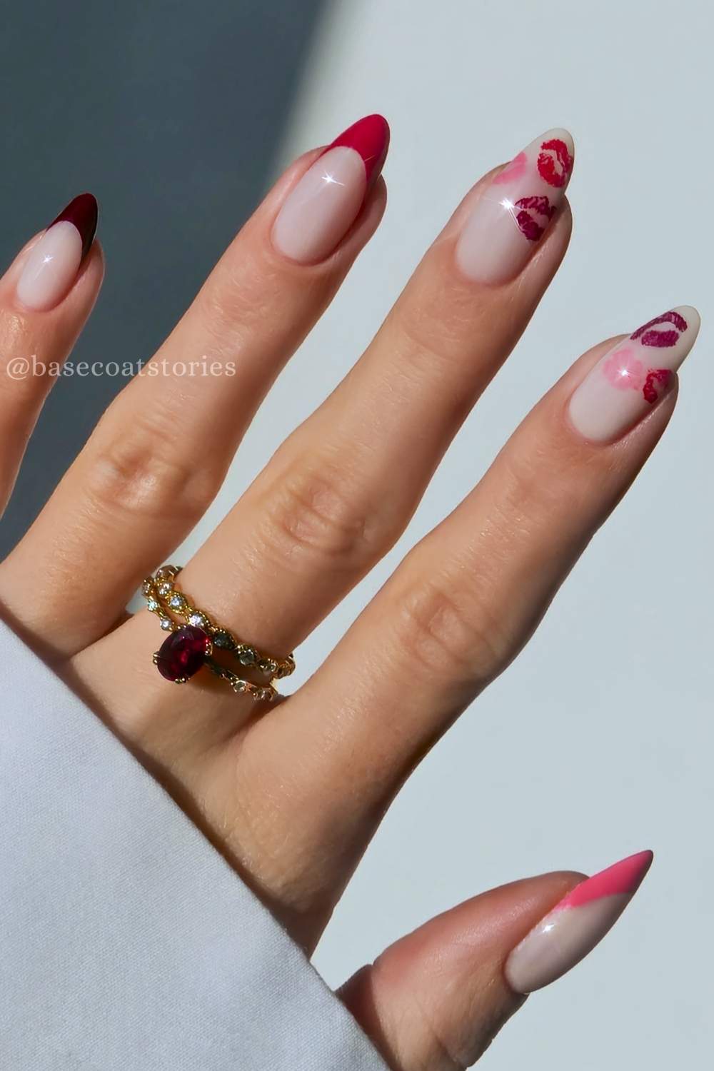 Pink and red French nails with kissy lip art