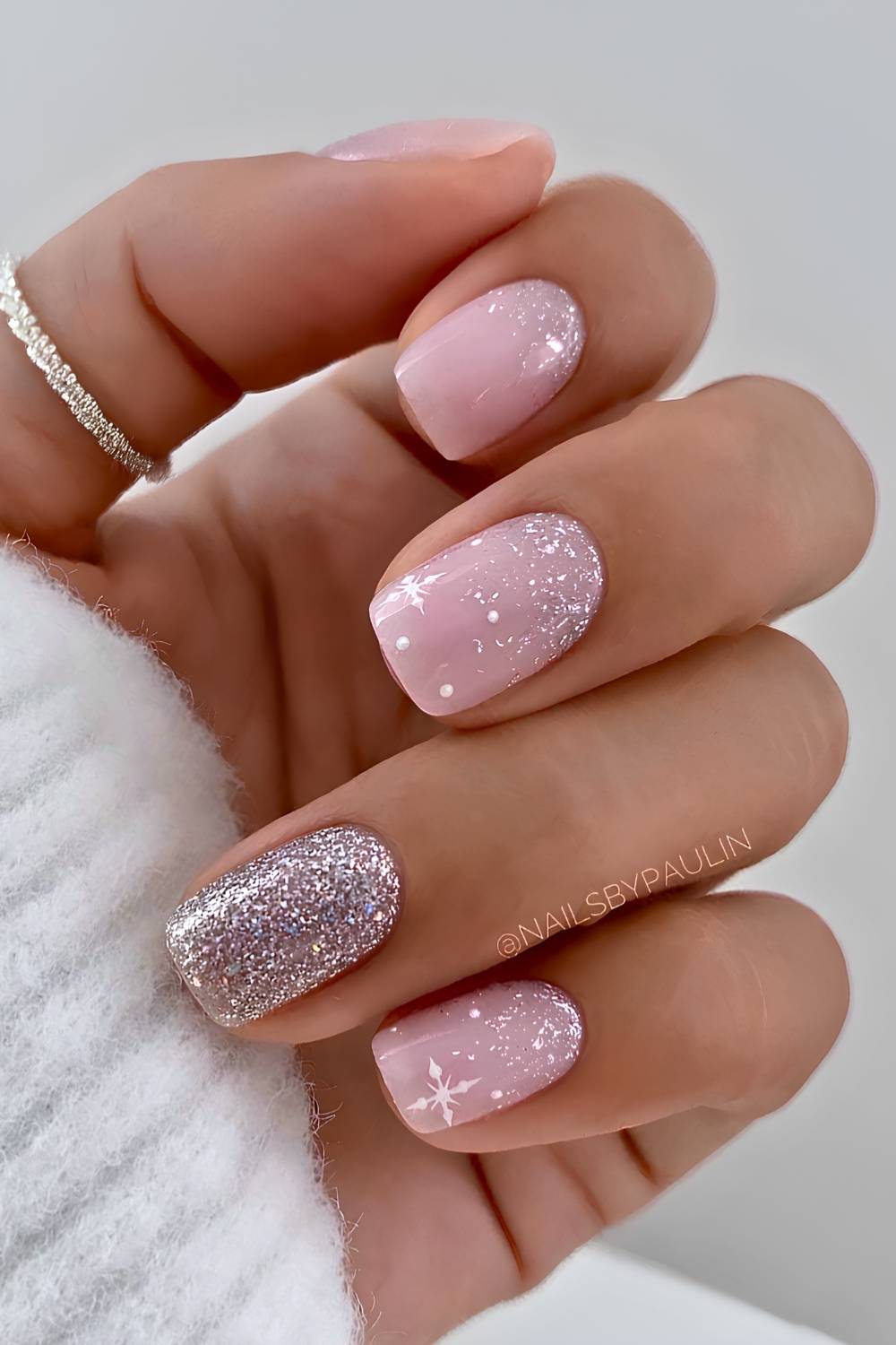 Pink and silver Christmas nails