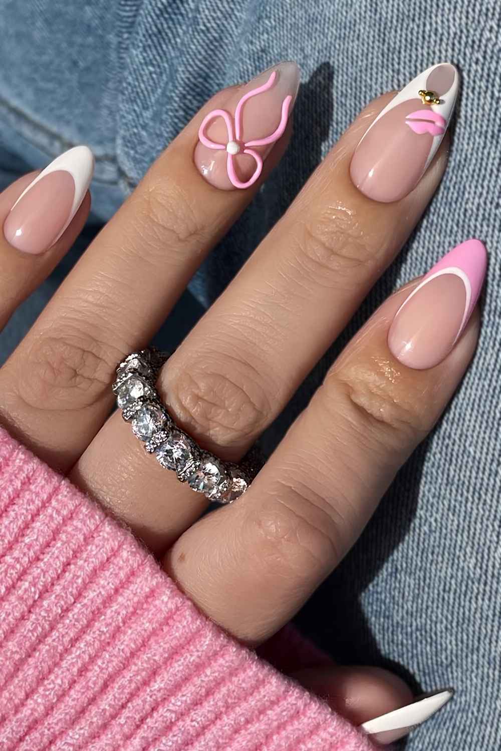Pink and white coquette French nails with bows