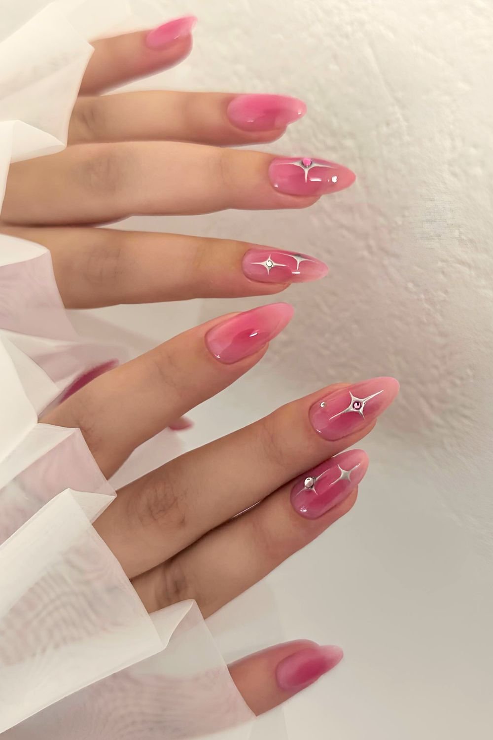 Pink aura jelly mani with silver star acccents