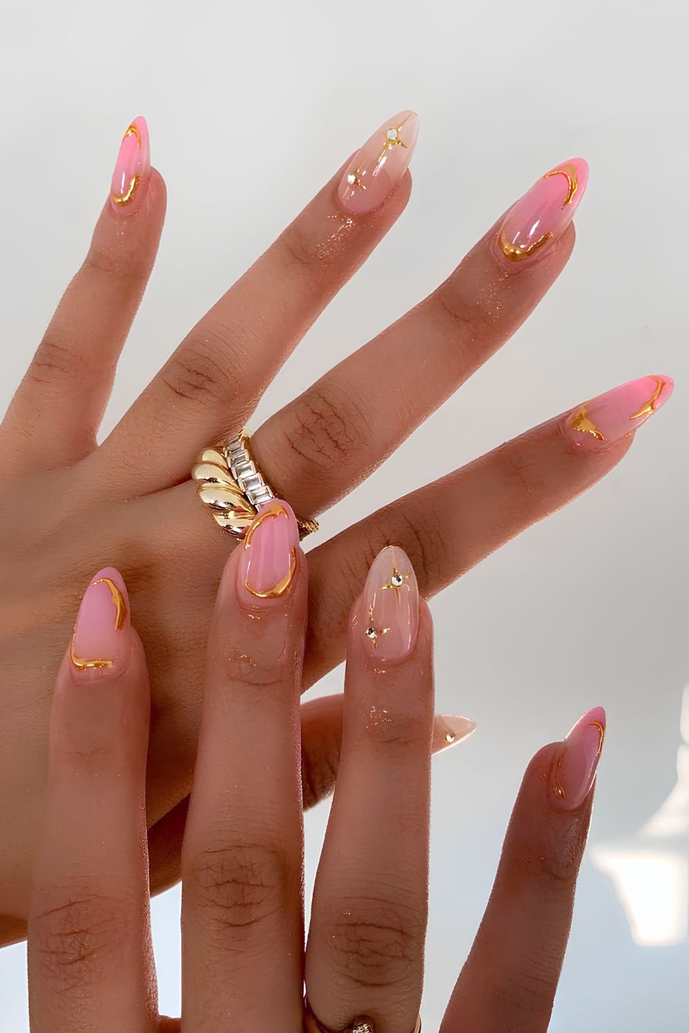 Pink aura mani with metallic gold details