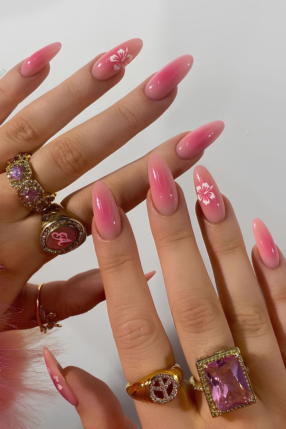 Pink aura nails with hibiscus flowers