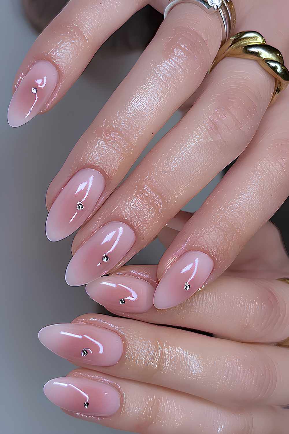 Pink aura nails with rhinestones
