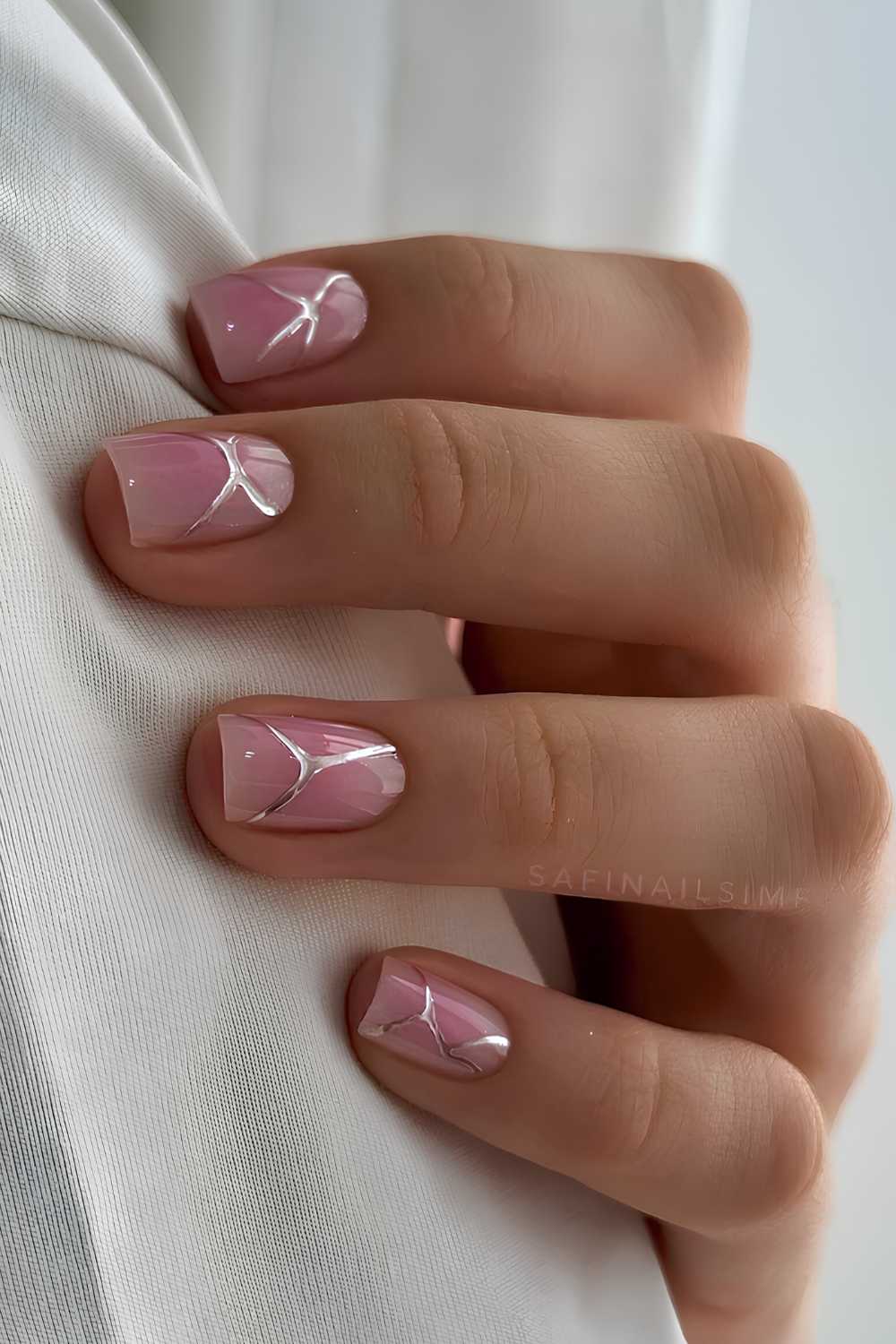 Pink aura nails with silver chrome details