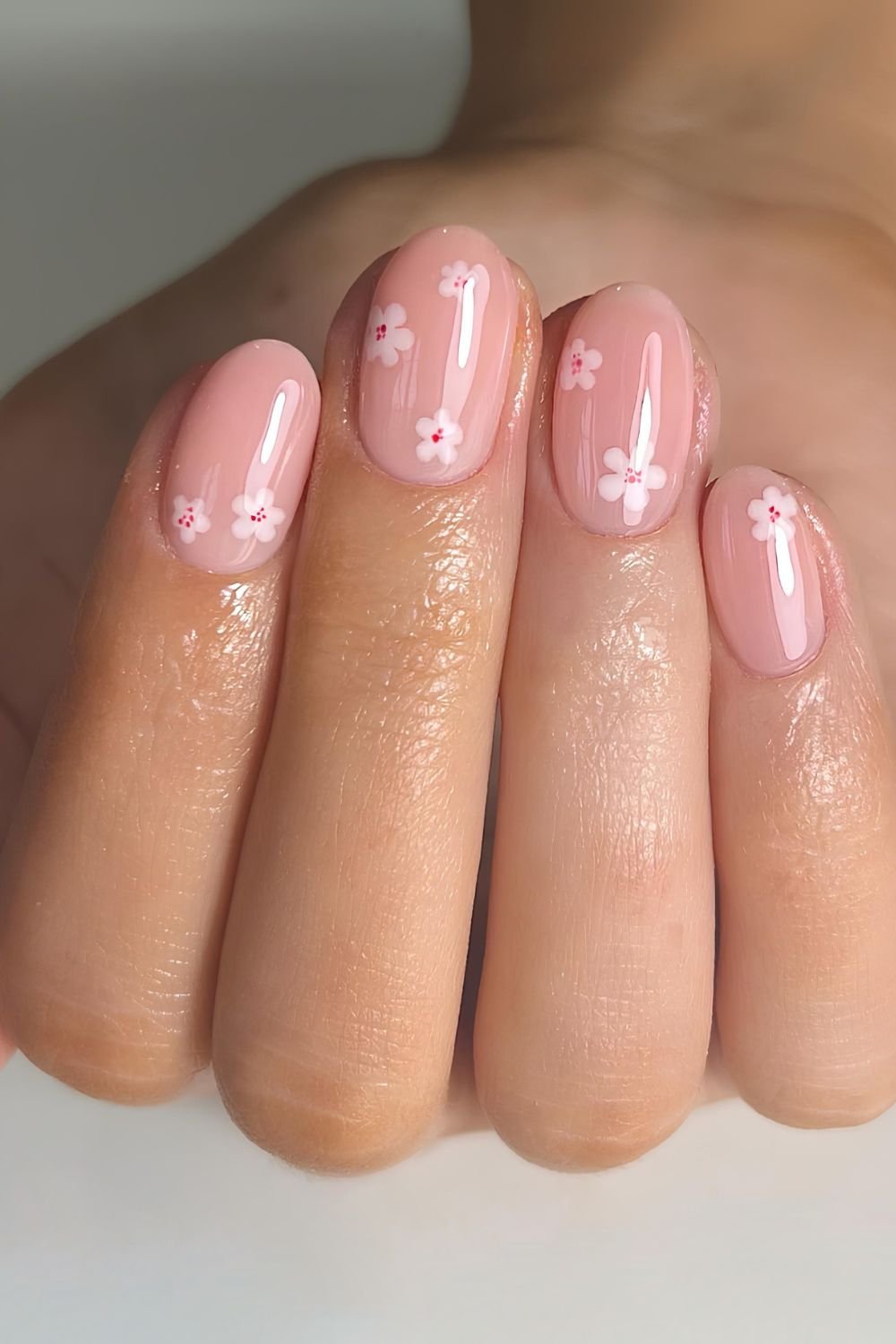 Pink jelly nails with cherry blossoms