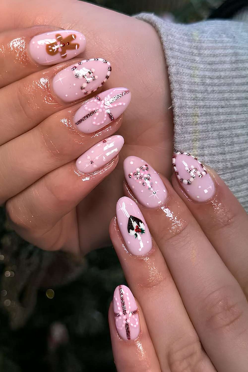 Pink nails with mixed Christmas art
