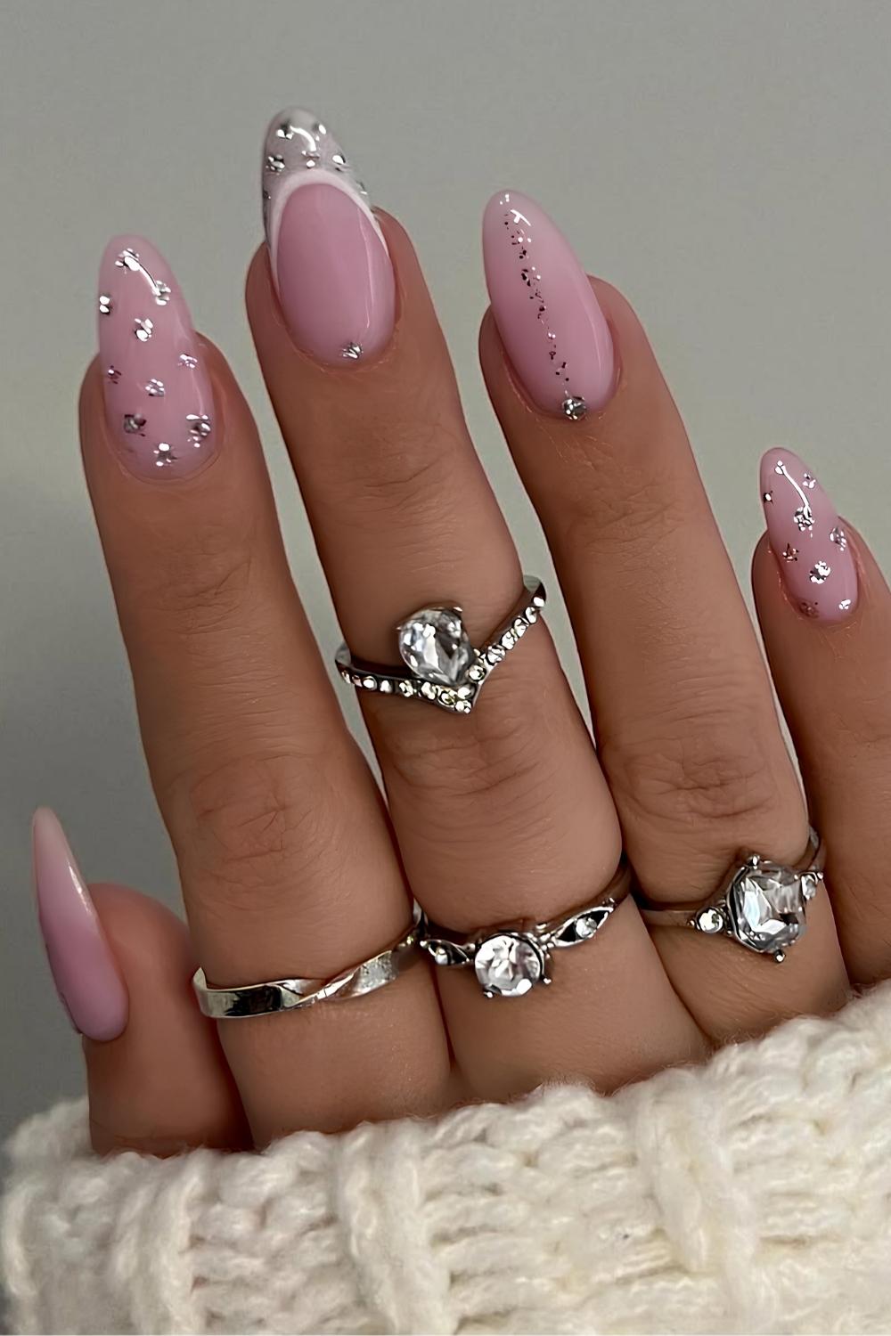 Pink nails with silver foil accents