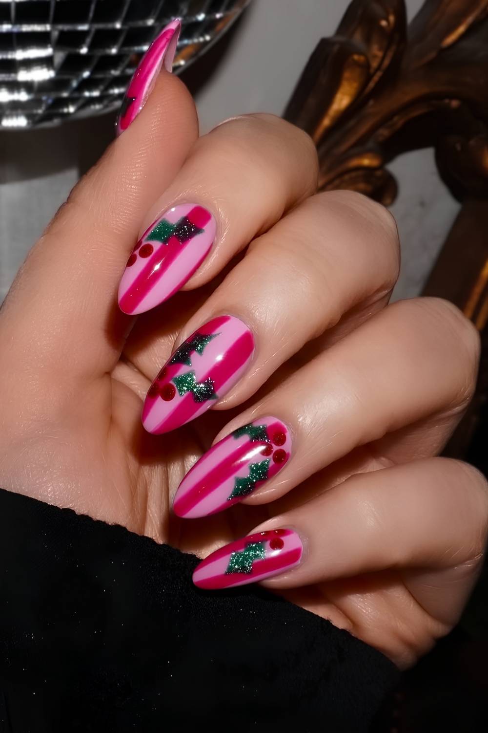 Pink nails with stripe and Christmas holly art