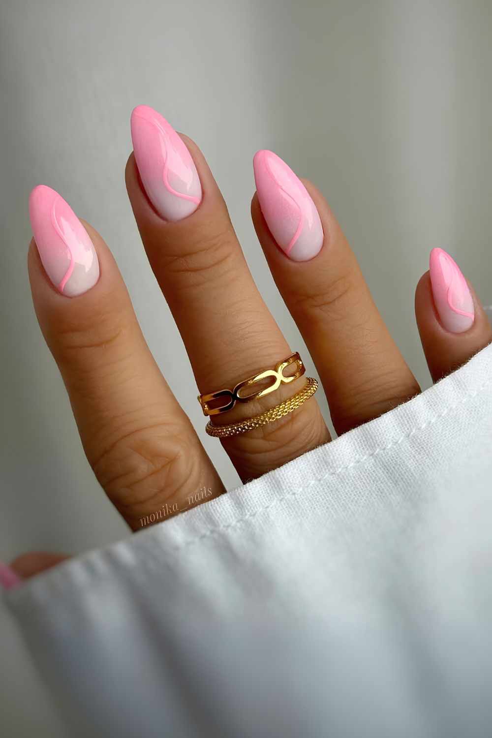 Pink ombre nails with swirl art