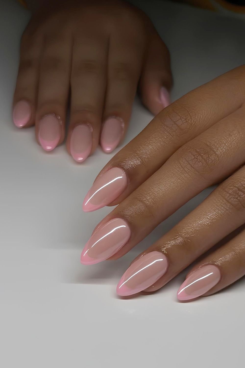 Pink on pink French mani with chrome overlay