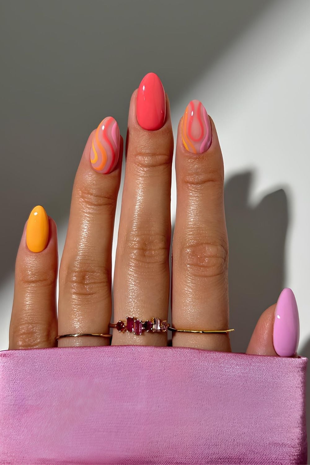 Pink, orange and yellow mani with gradient swirls