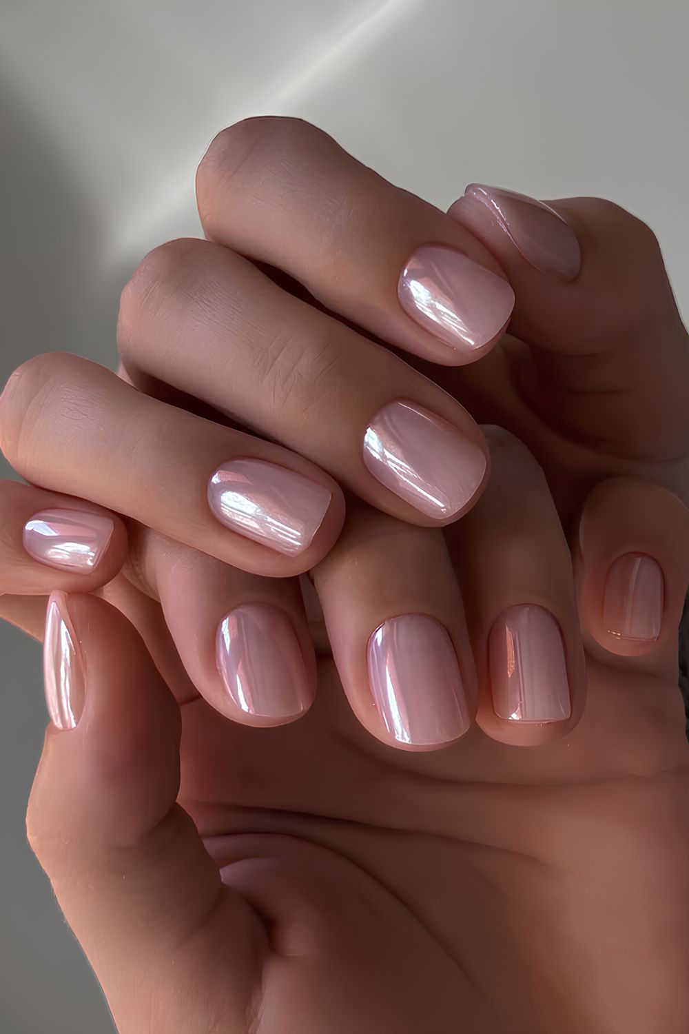 Pink pearl chrome manicure