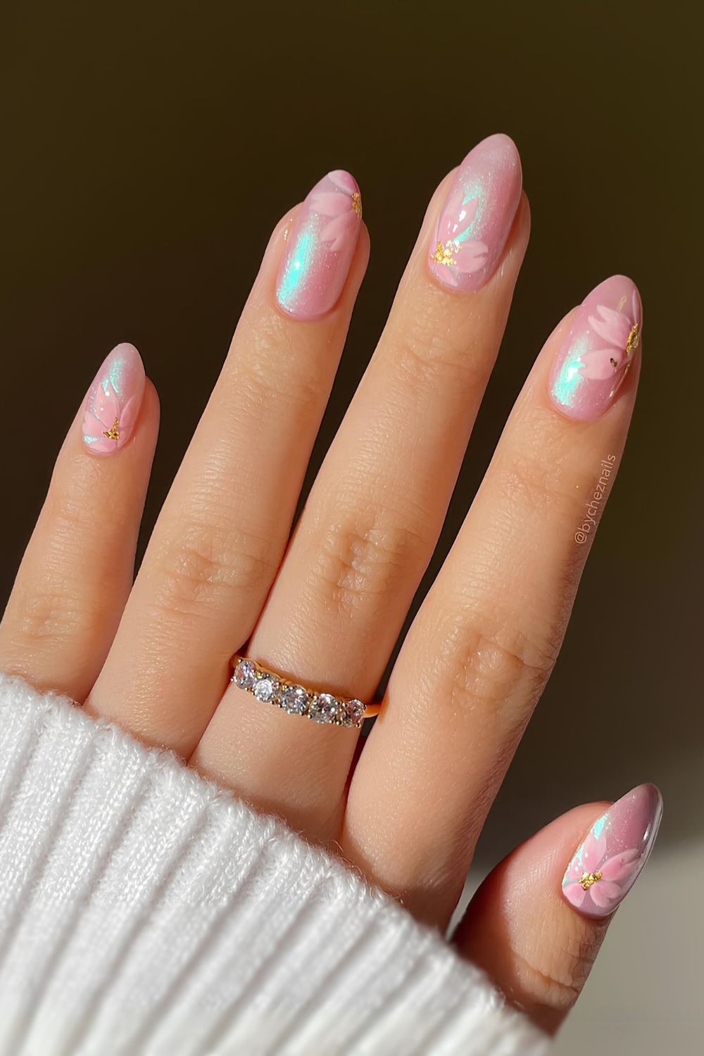 Pink satin nails with sakura art