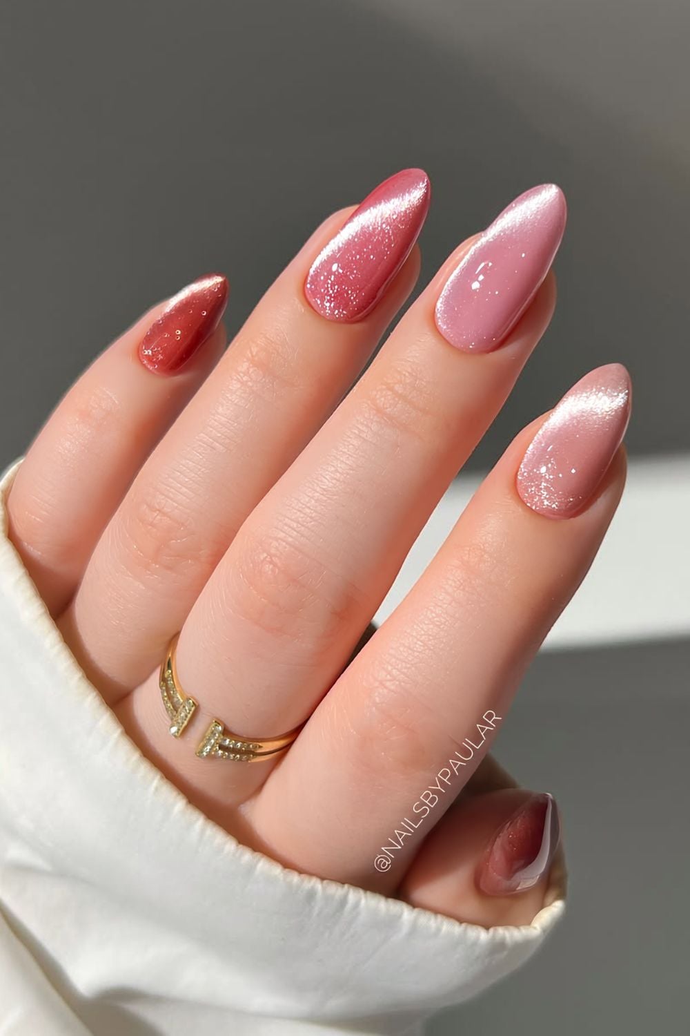 Pink skittle cat eye nails