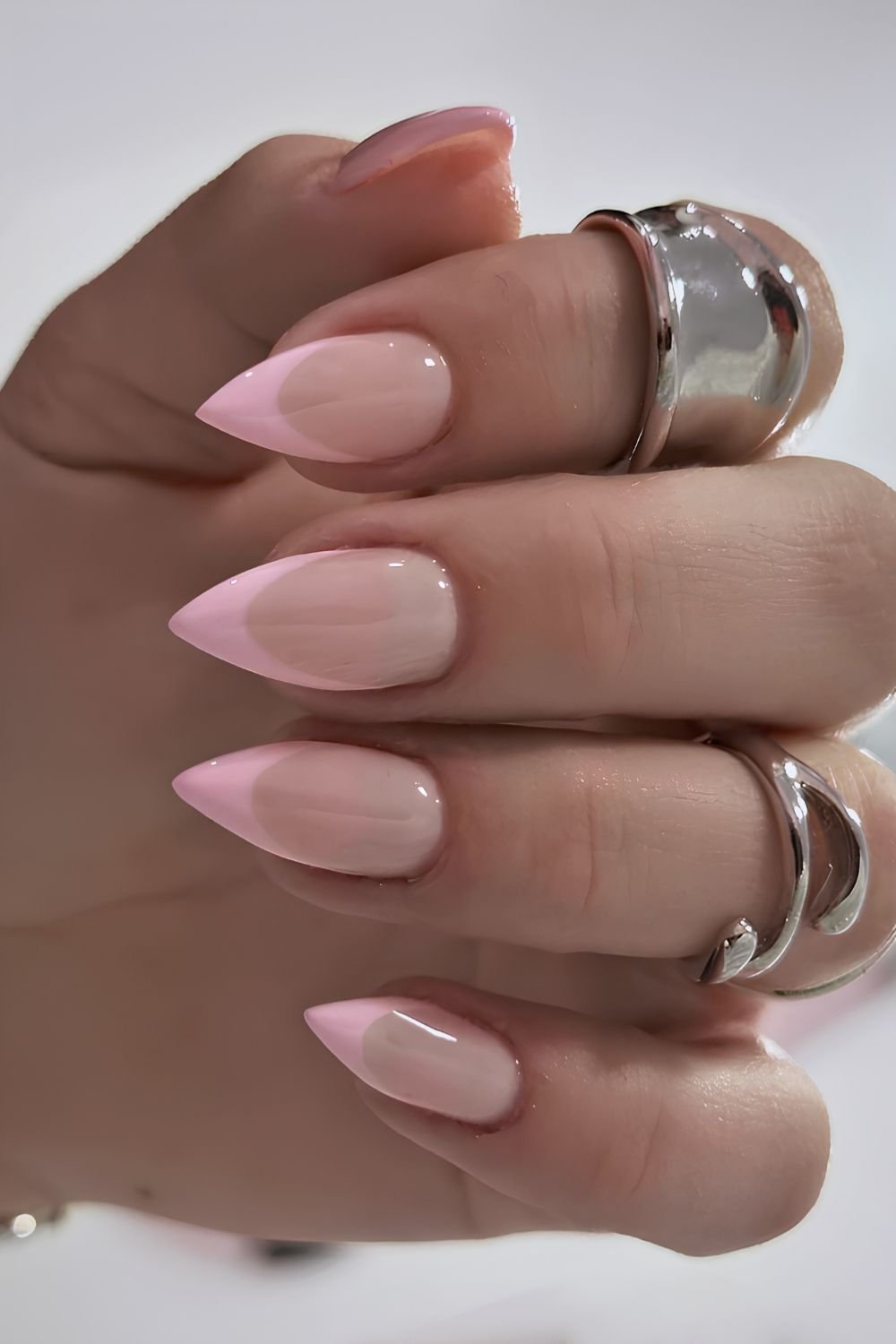 Pink stiletto French nails