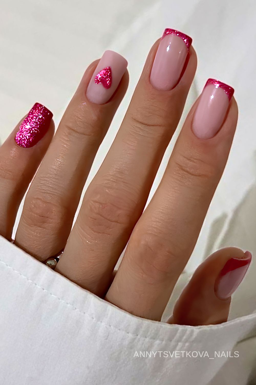 Pink velvet nails with accent heart