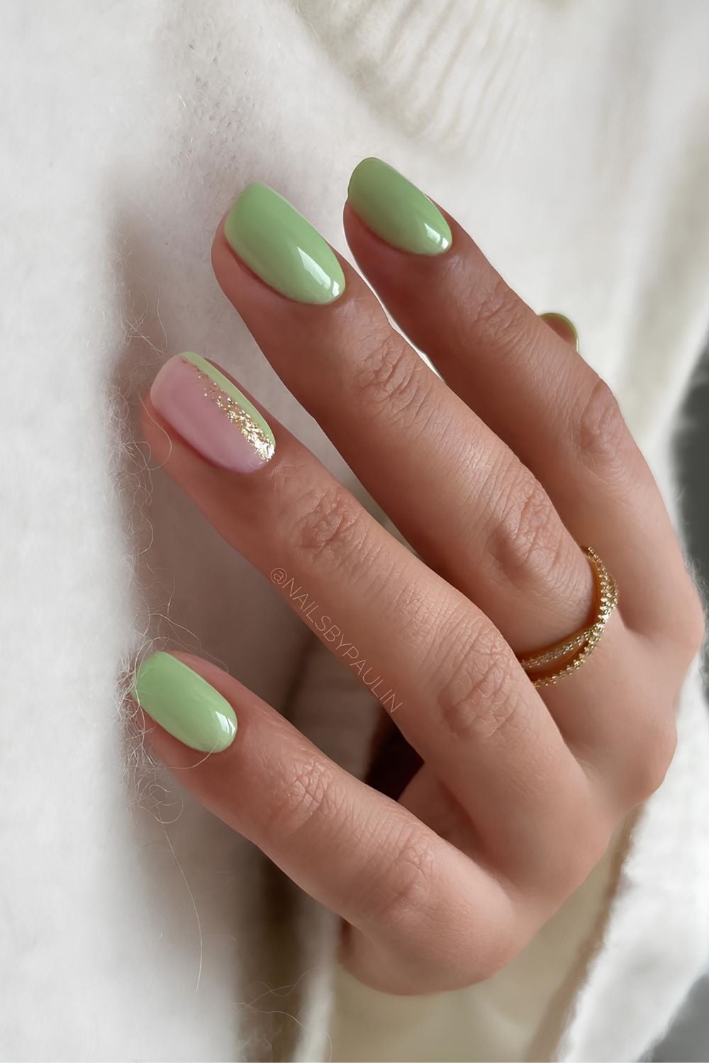 Pistachio green nails wih glitter accent