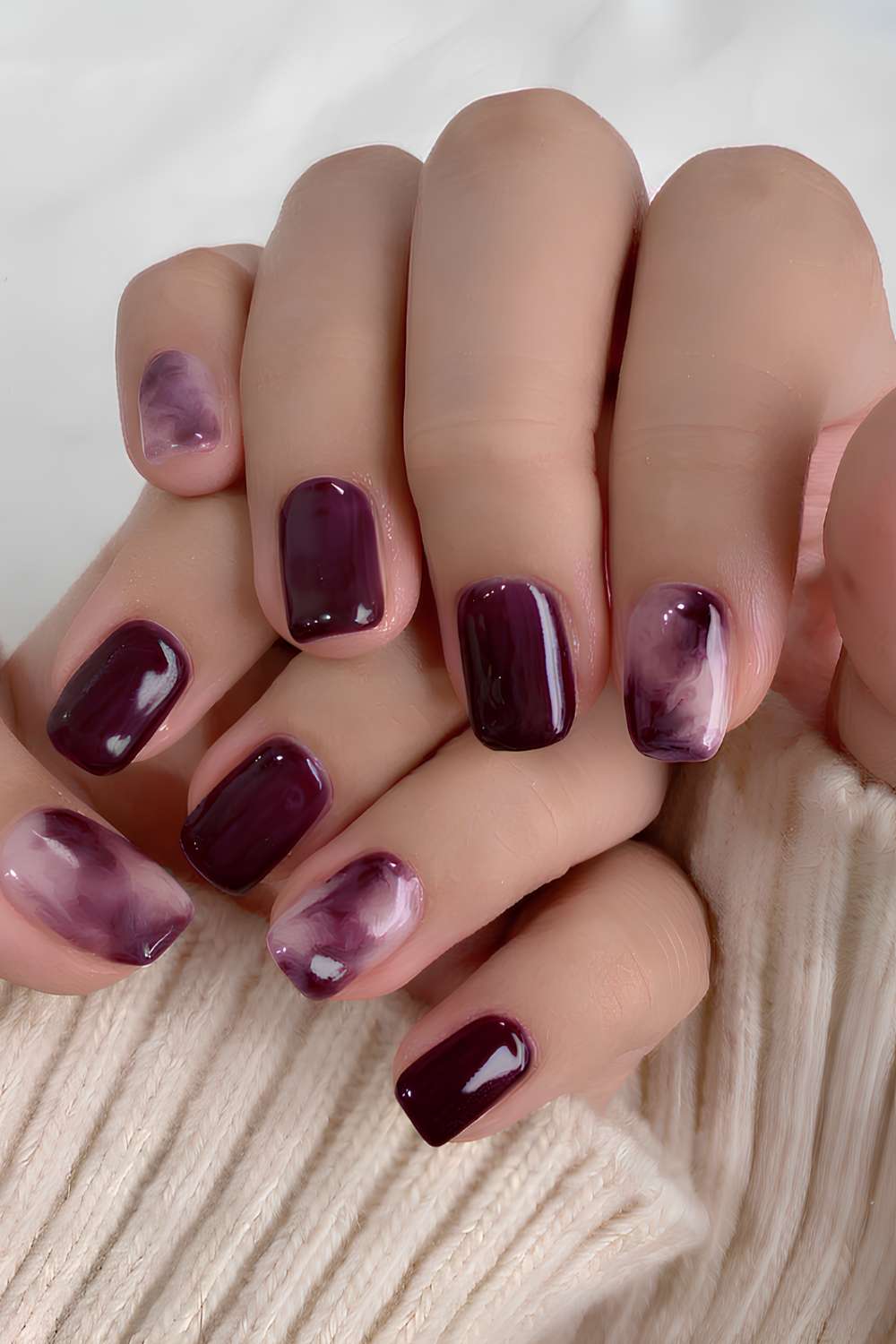 Plum nails with marble art