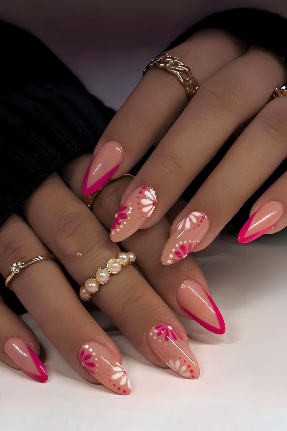Pointed hot pink French mani with flowers