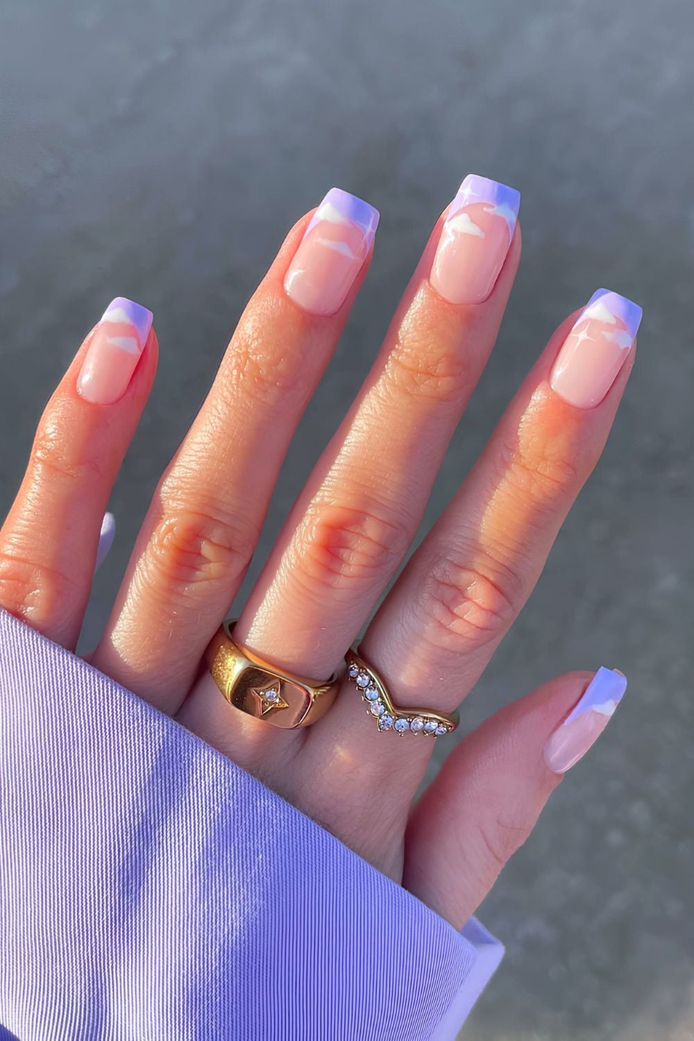 Purple French nails with cloud accents