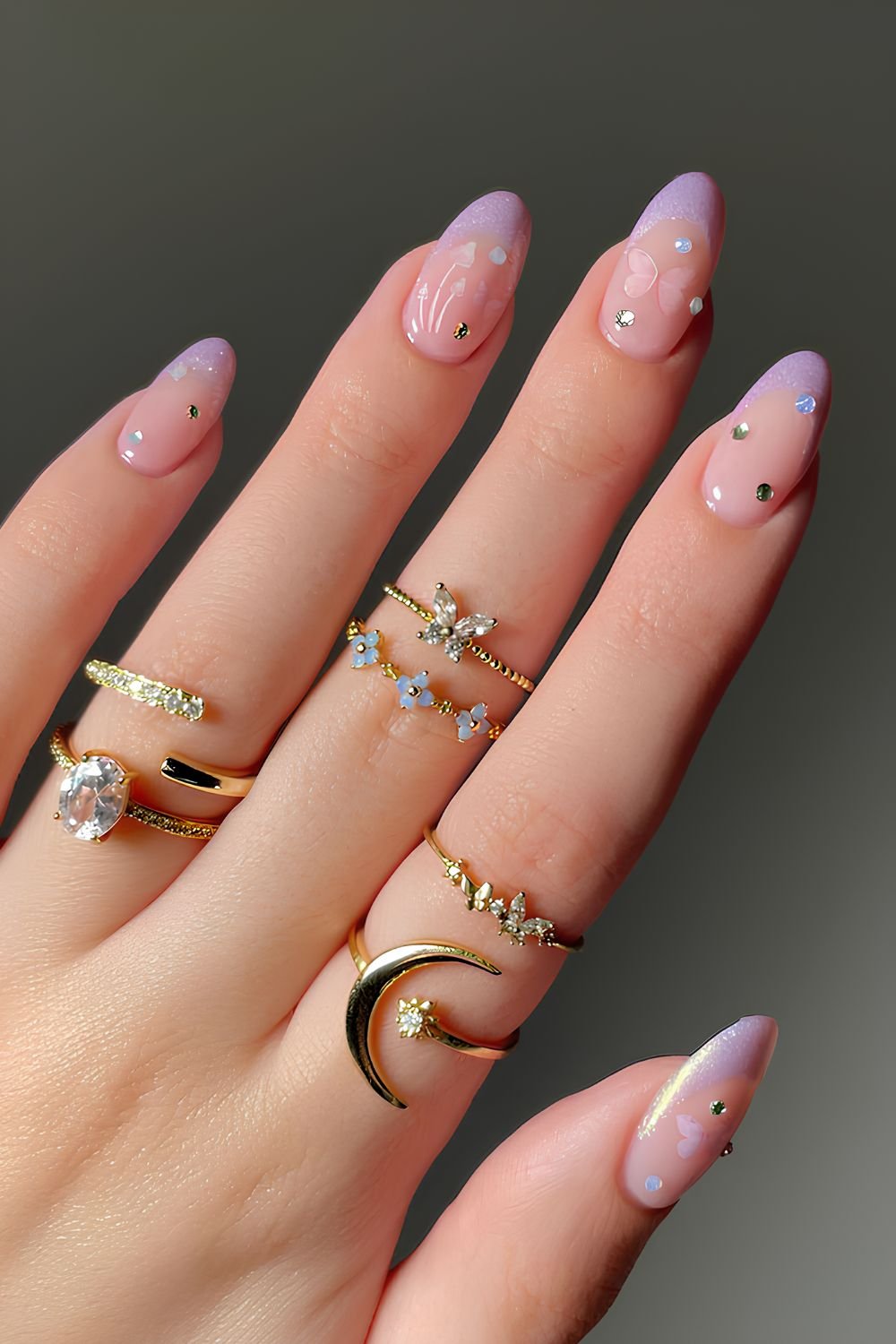 Purple French nails with rhinestones and butterflies