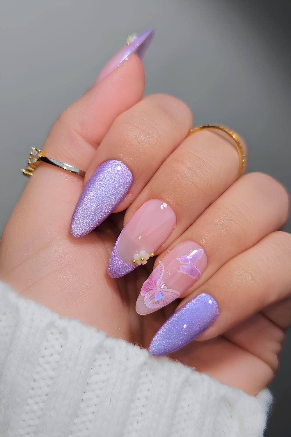 Purple cat eye nails with butterflies
