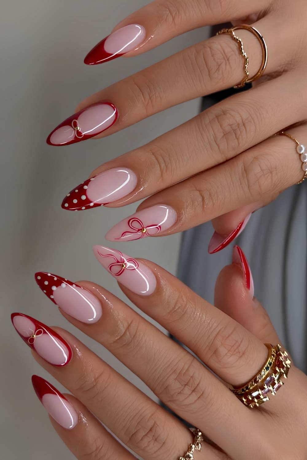 Red French nails with bows and polka dots