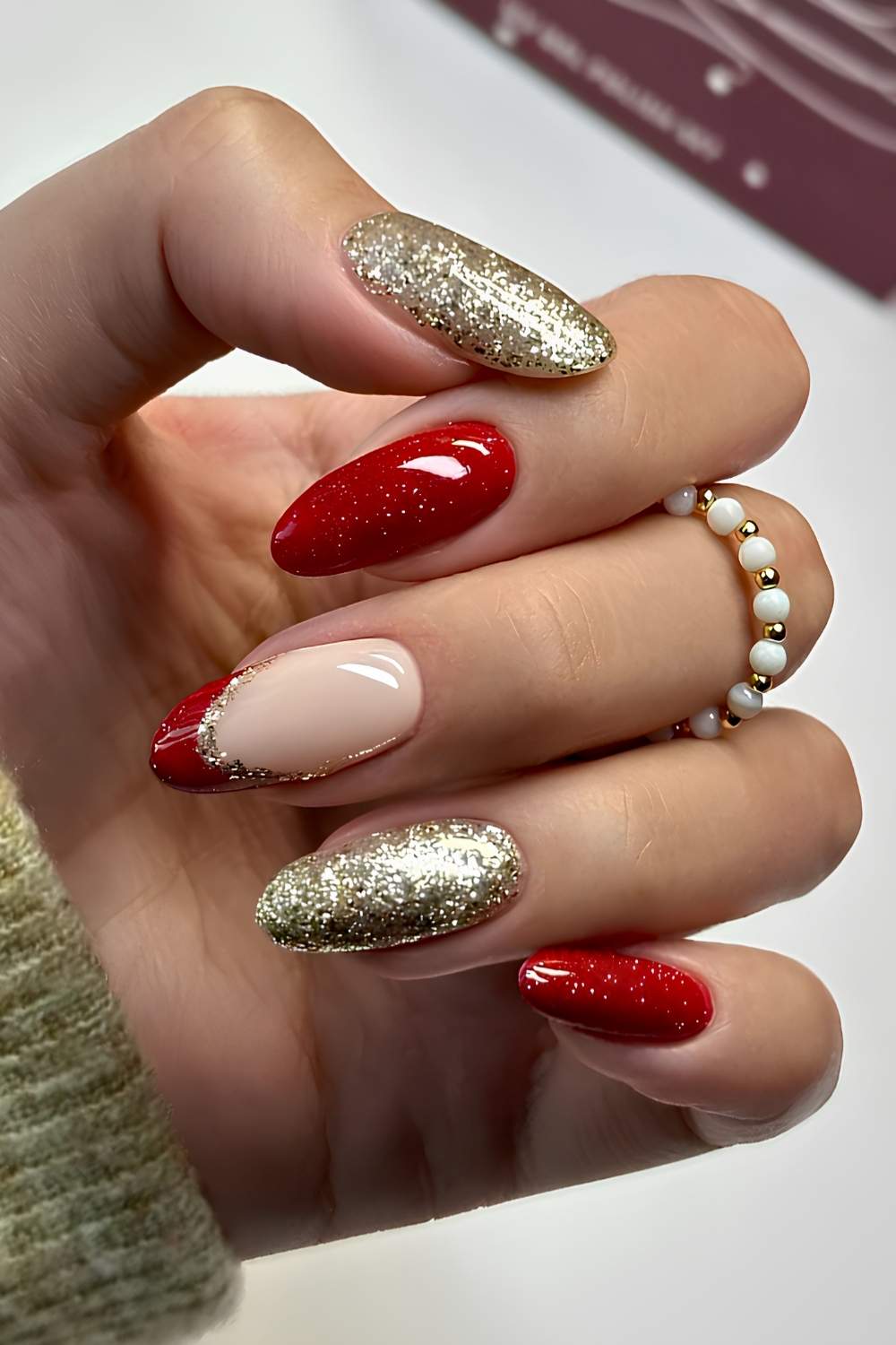Red and gold glitter Christmas nails